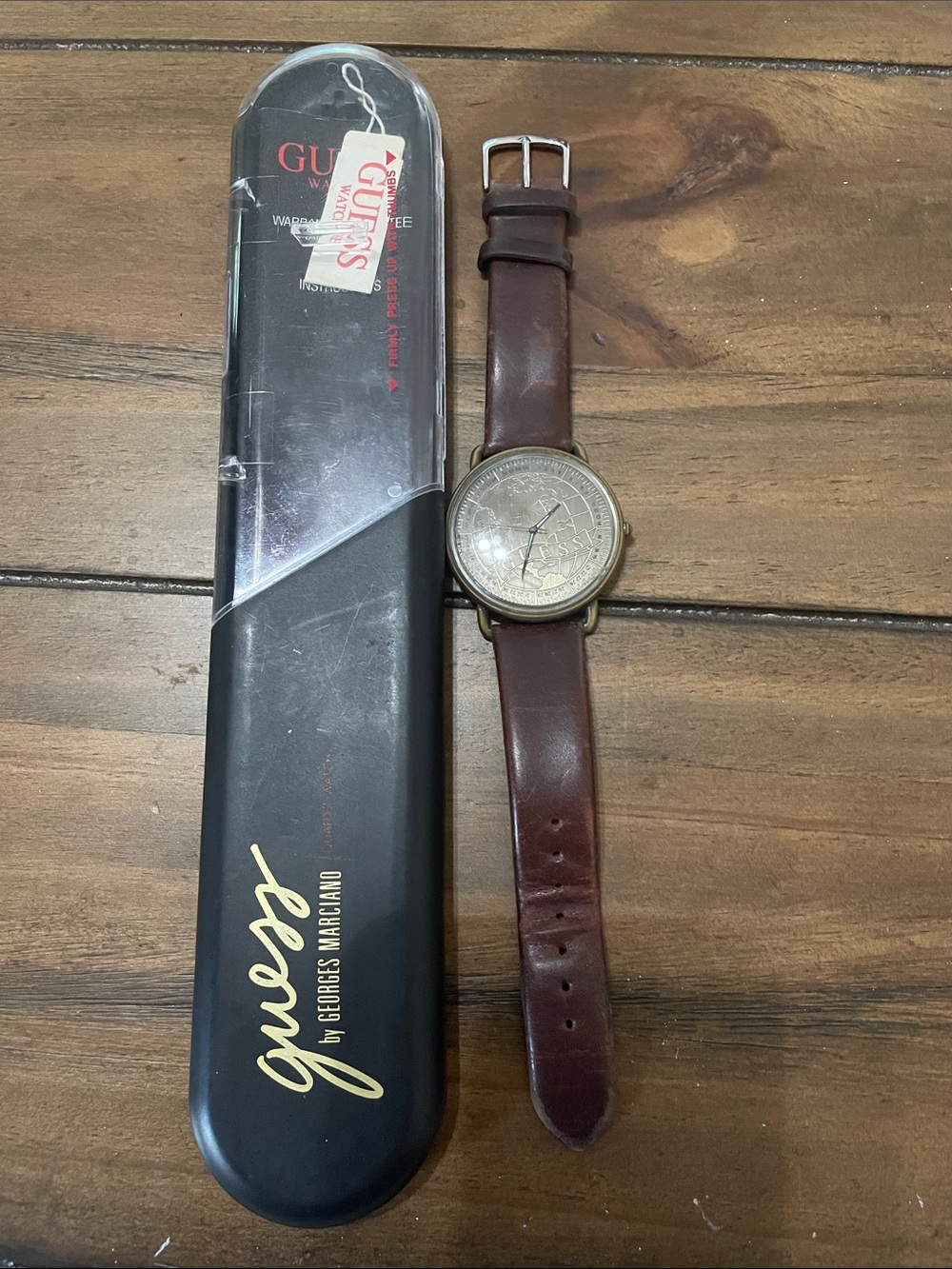 Title: Vintage 1992 GUESS World Map Watch with Original Hard Case